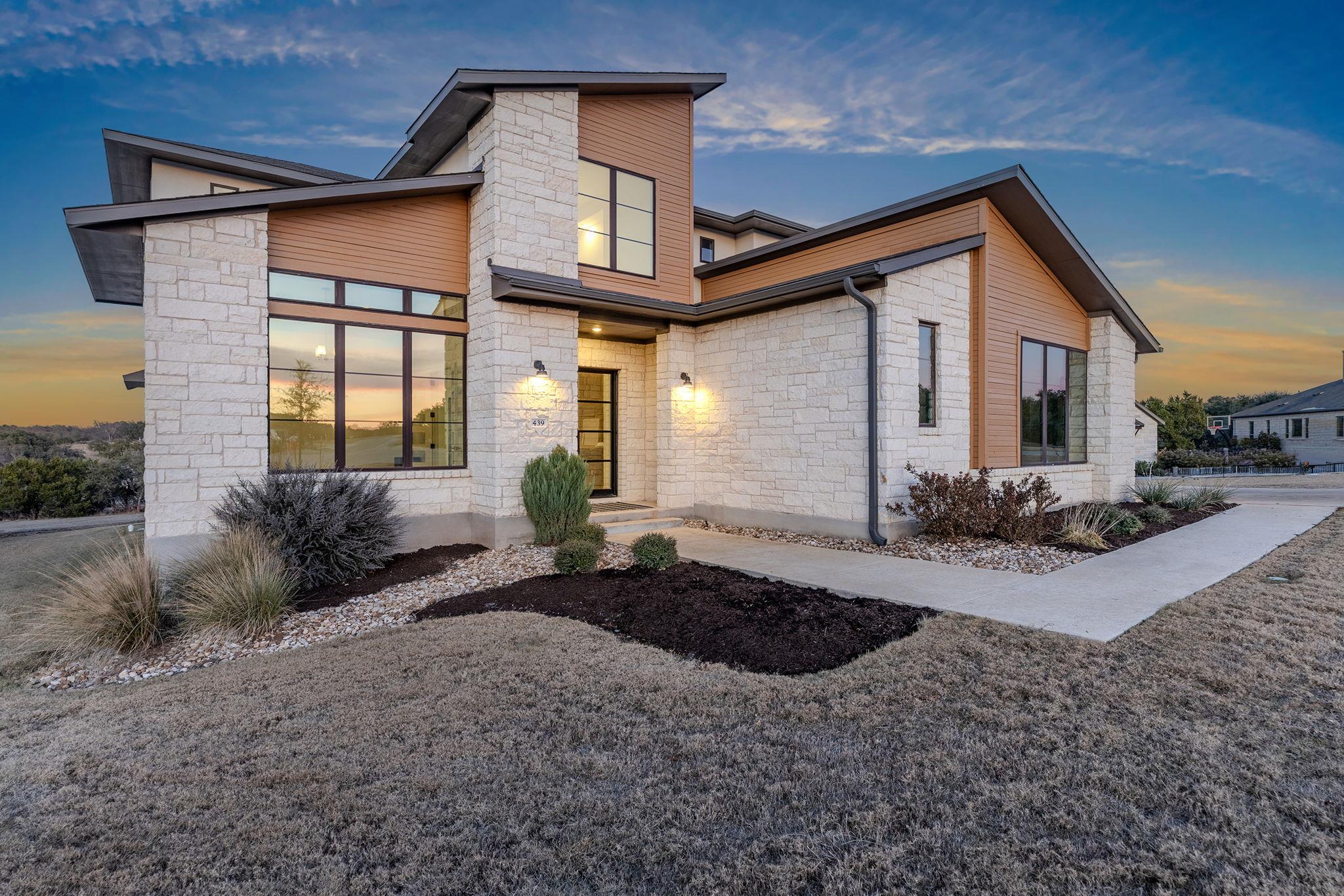 Contemporary house with stone siding