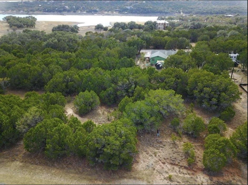 Aerial view of property and surrounding area with