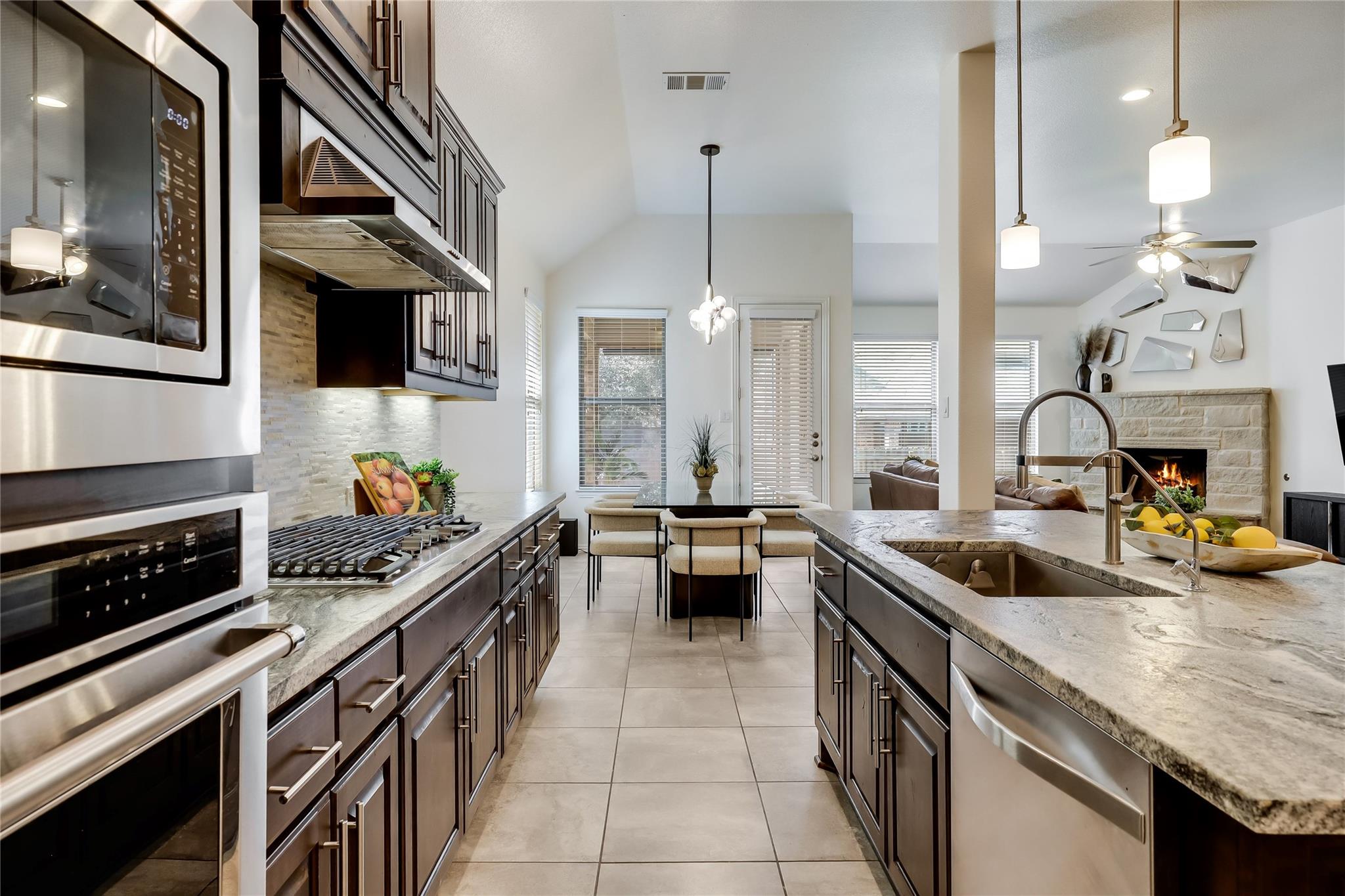 Kitchen featuring stainless steel appliances, dar