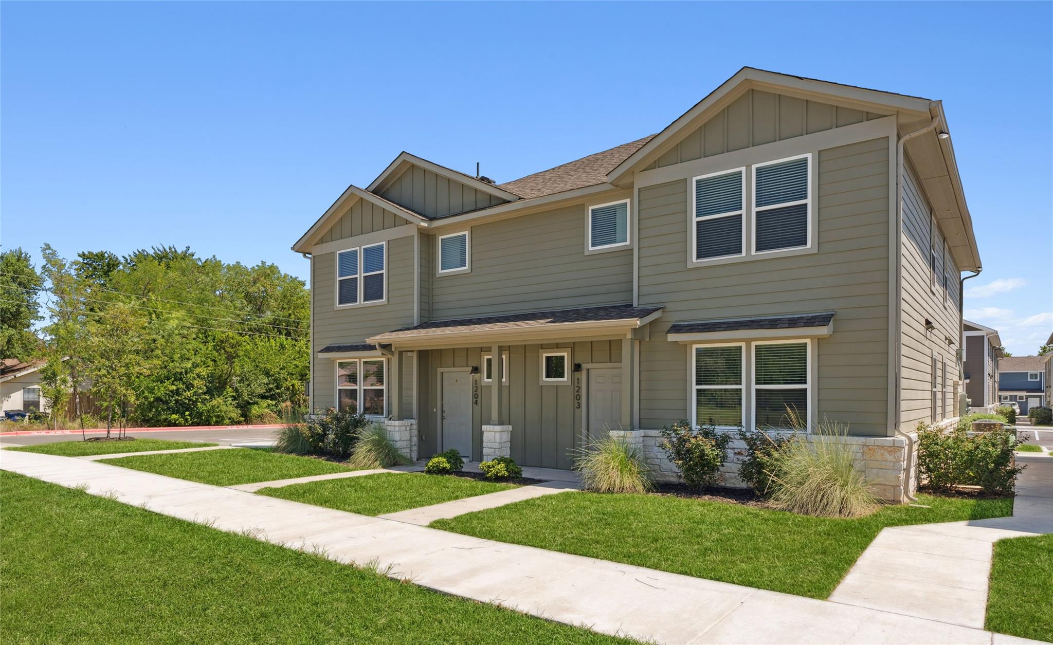 Craftsman-style house featuring board and batten 