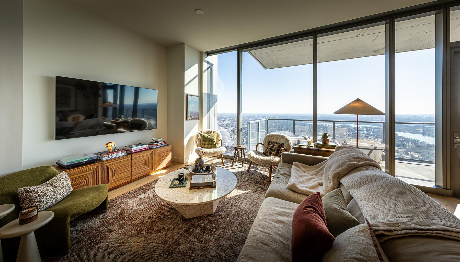 Living room featuring expansive windows and light