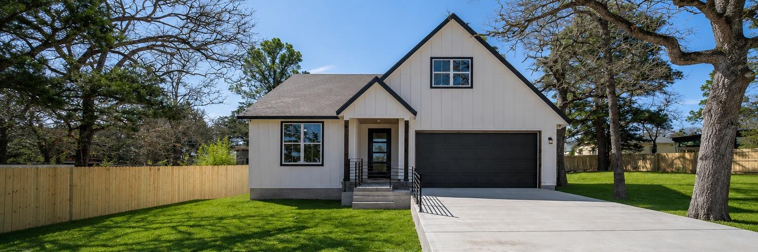 Crisp vertical siding paired with a dark double g