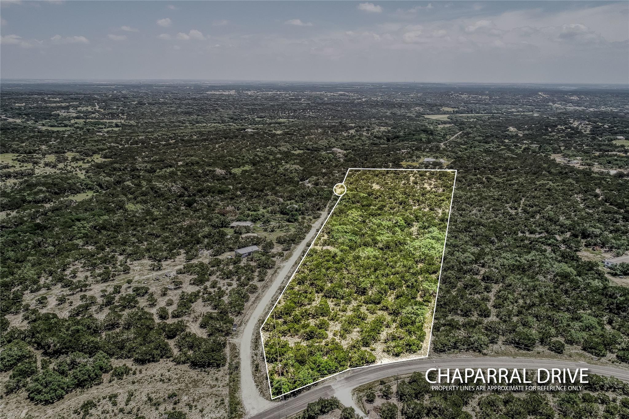 Aerial overview of property's location with prope