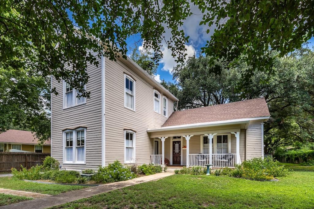 View of front of property featuring covered porch