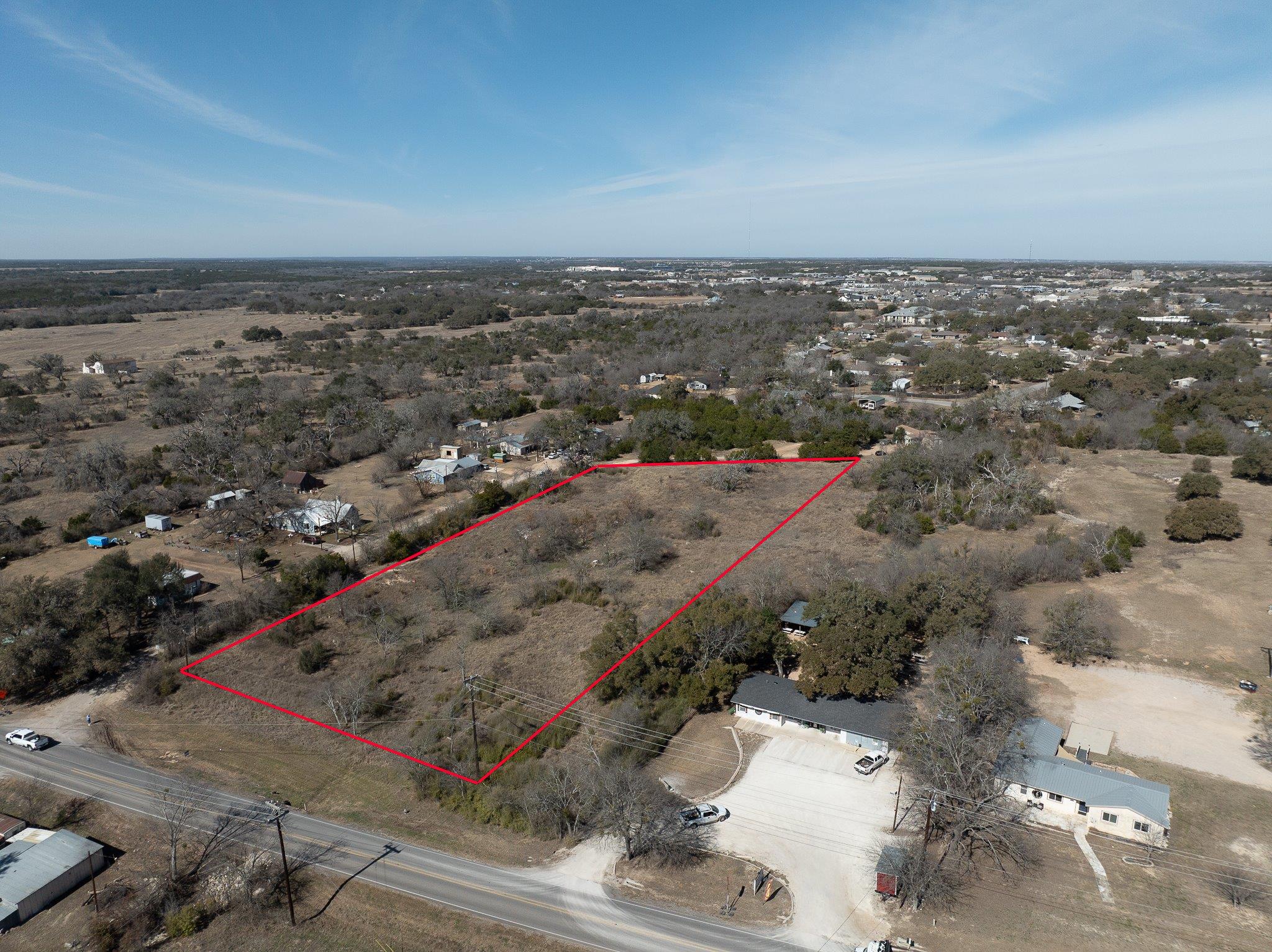 Aerial view of sparsely populated area featuring 