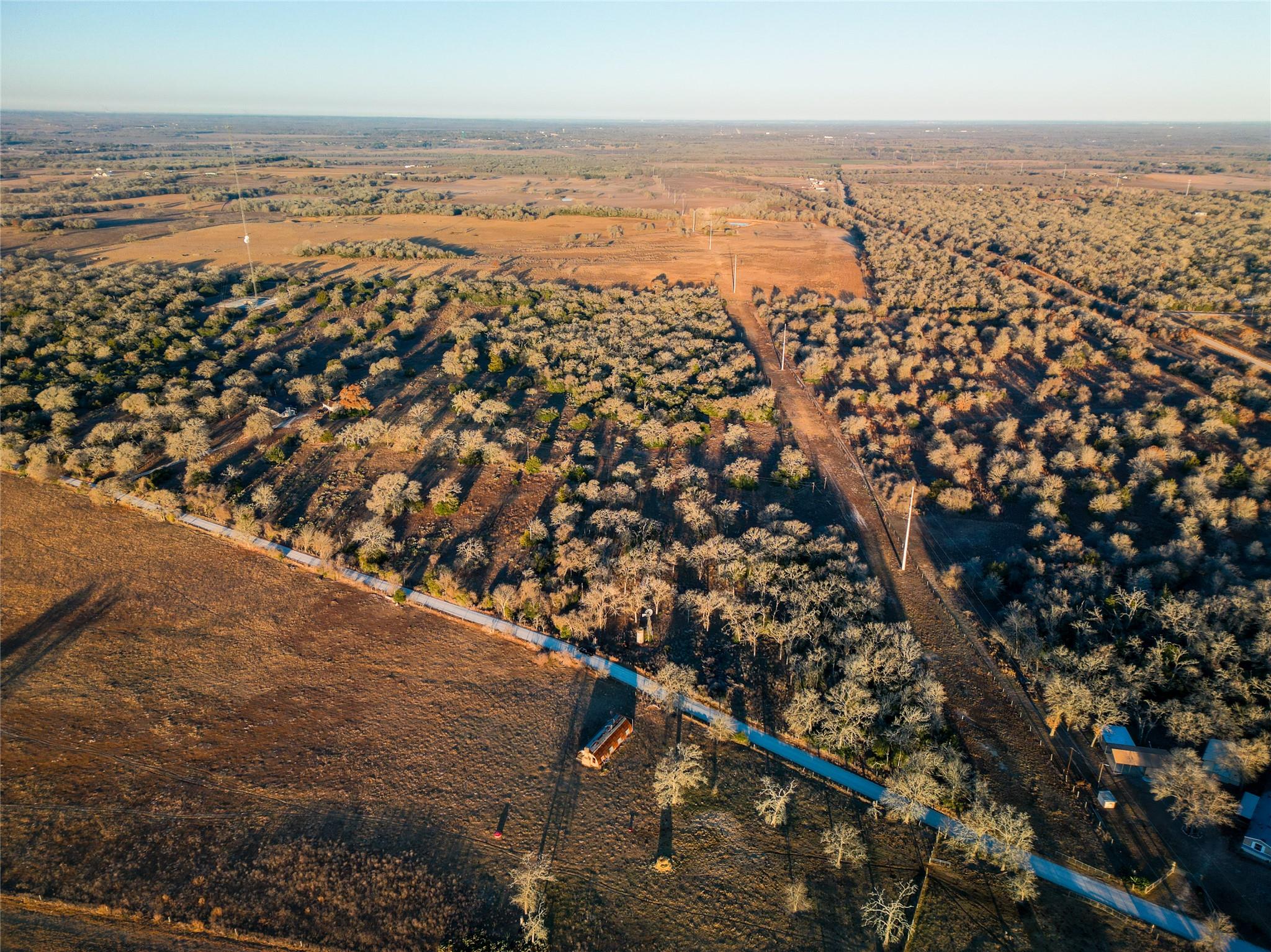Aerial view of property's location with rural lan