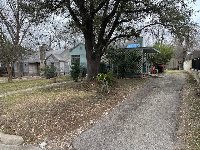 View of front of house with a chimney