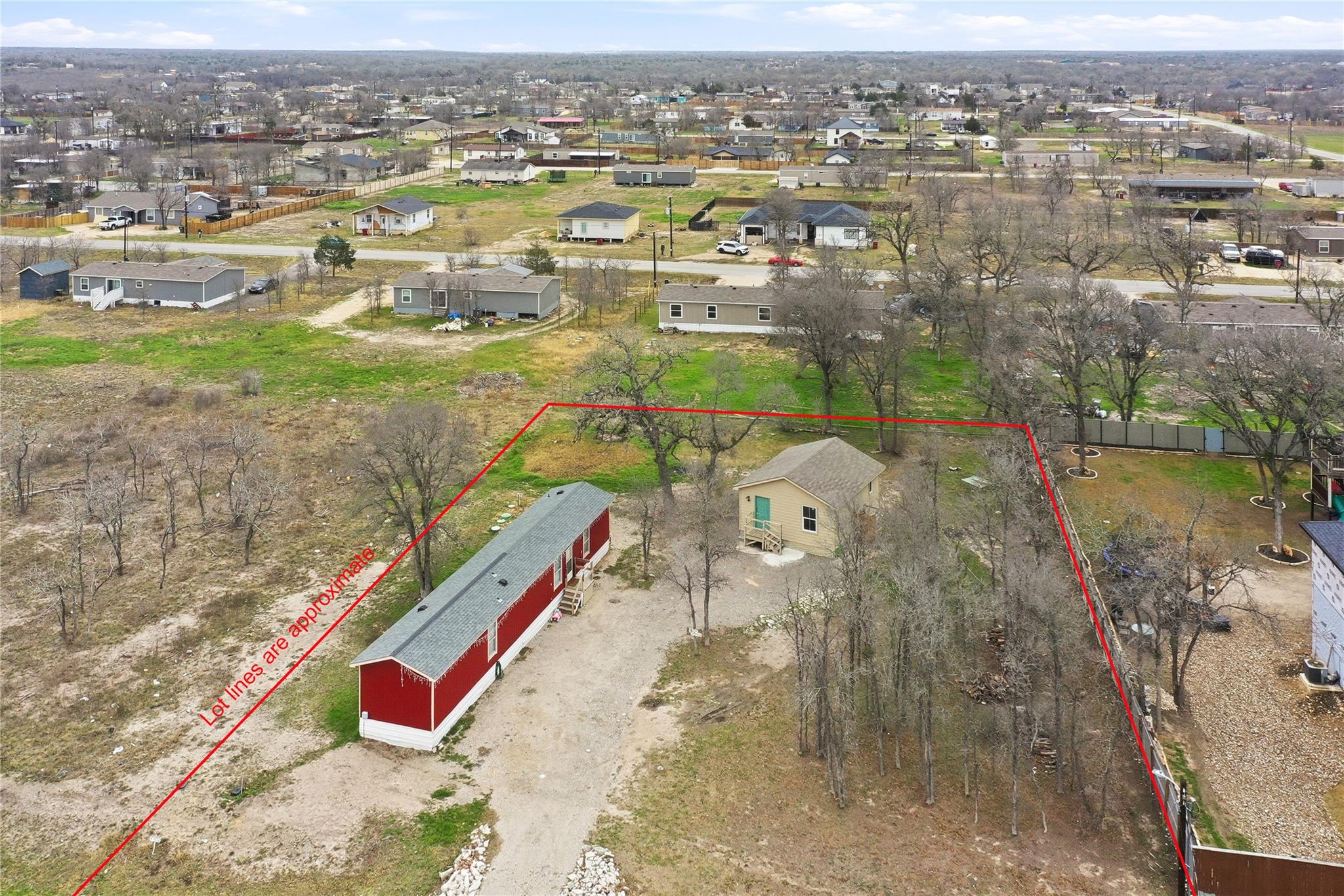Aerial perspective of suburban area with property