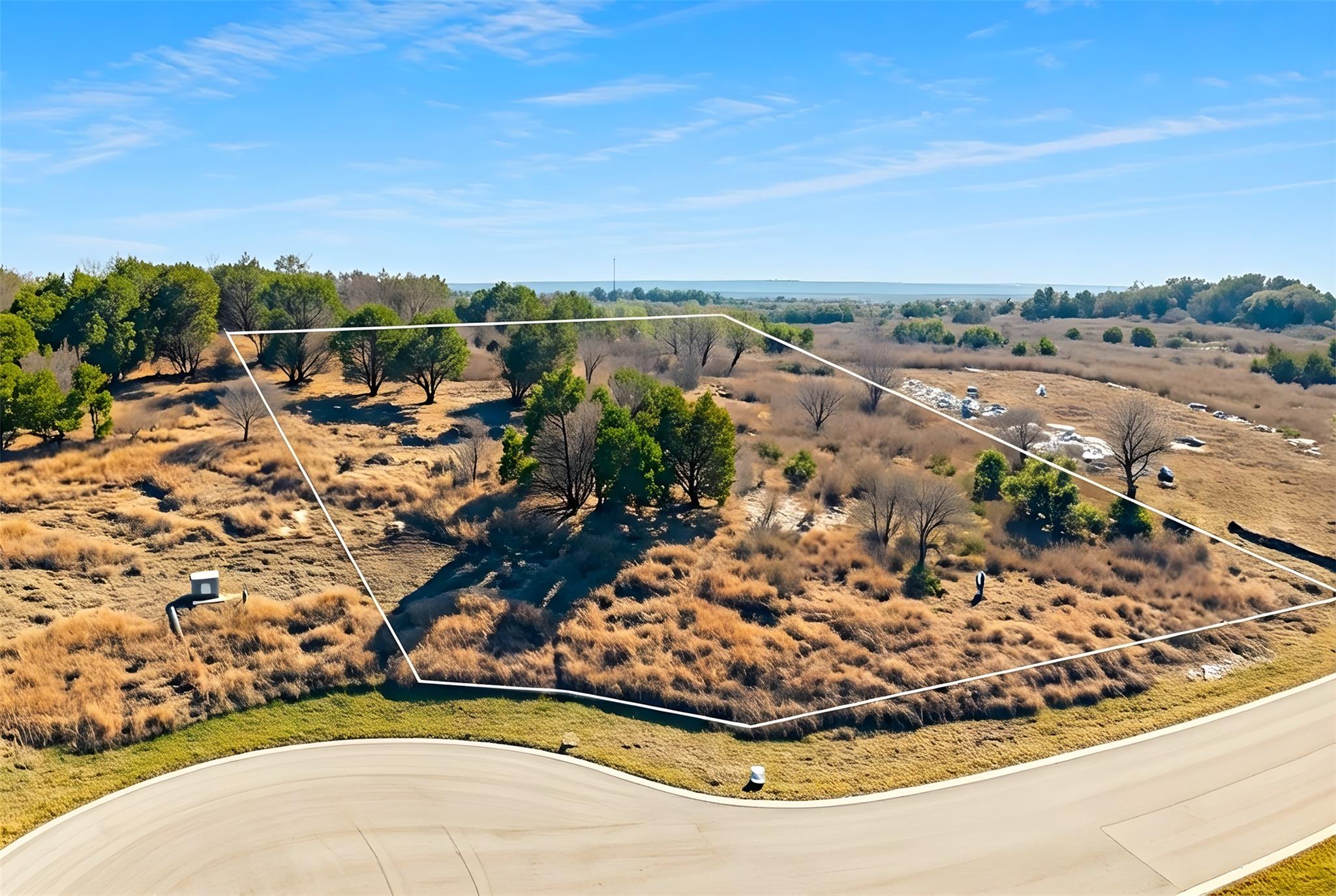 Aerial view of sparsely populated area with prope