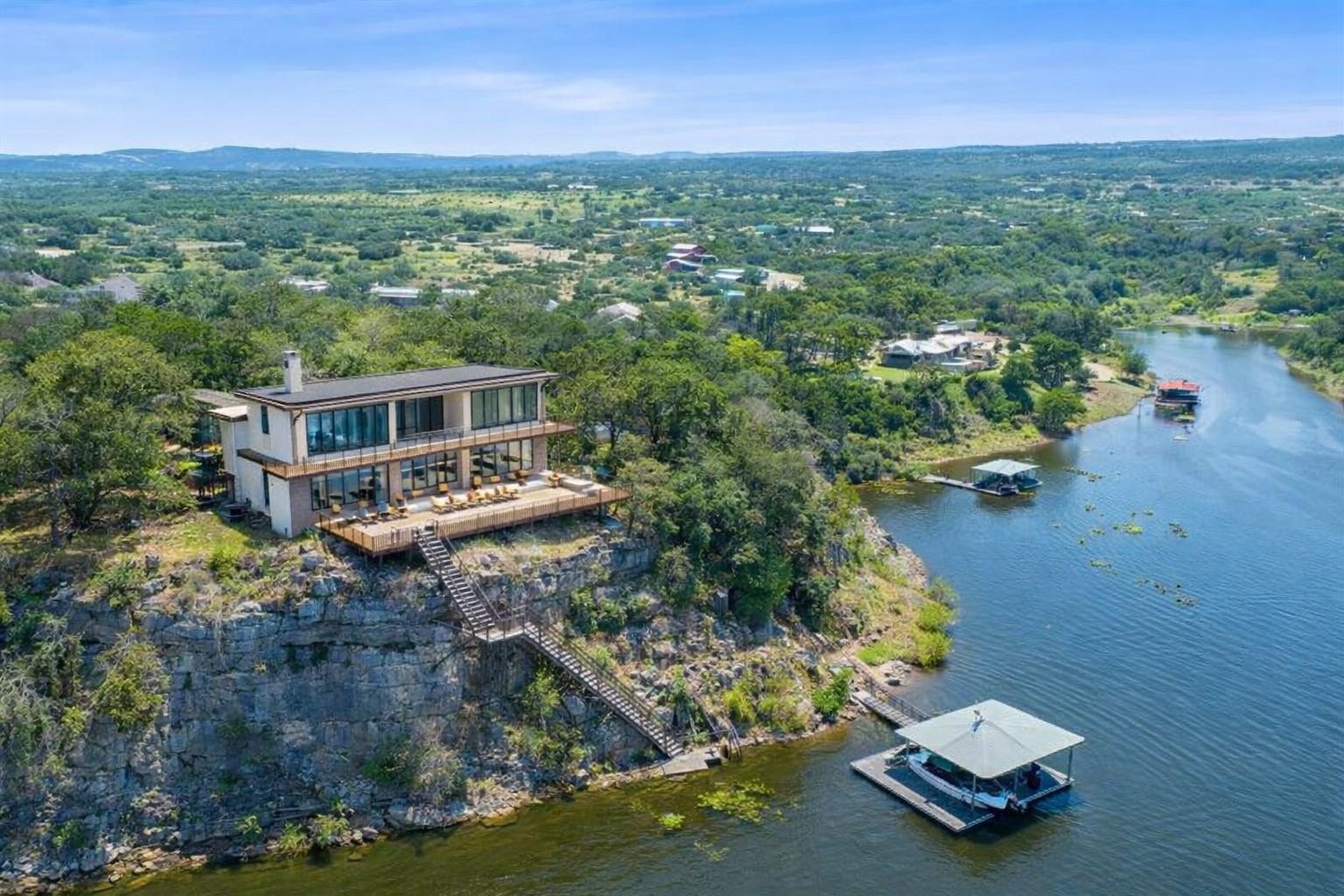 Aerial view of property and surrounding area with