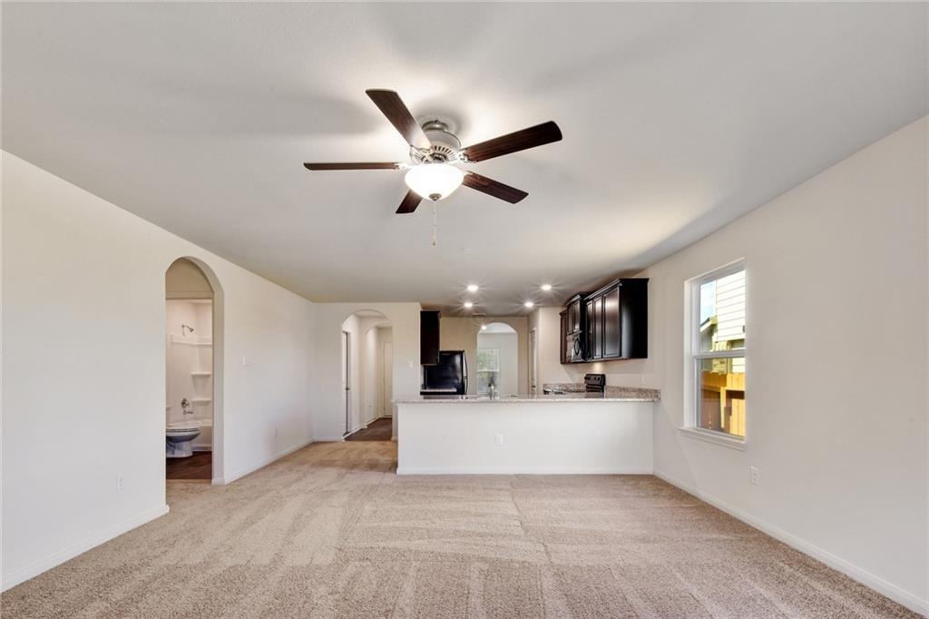 Unfurnished living room with light carpet, ceilin