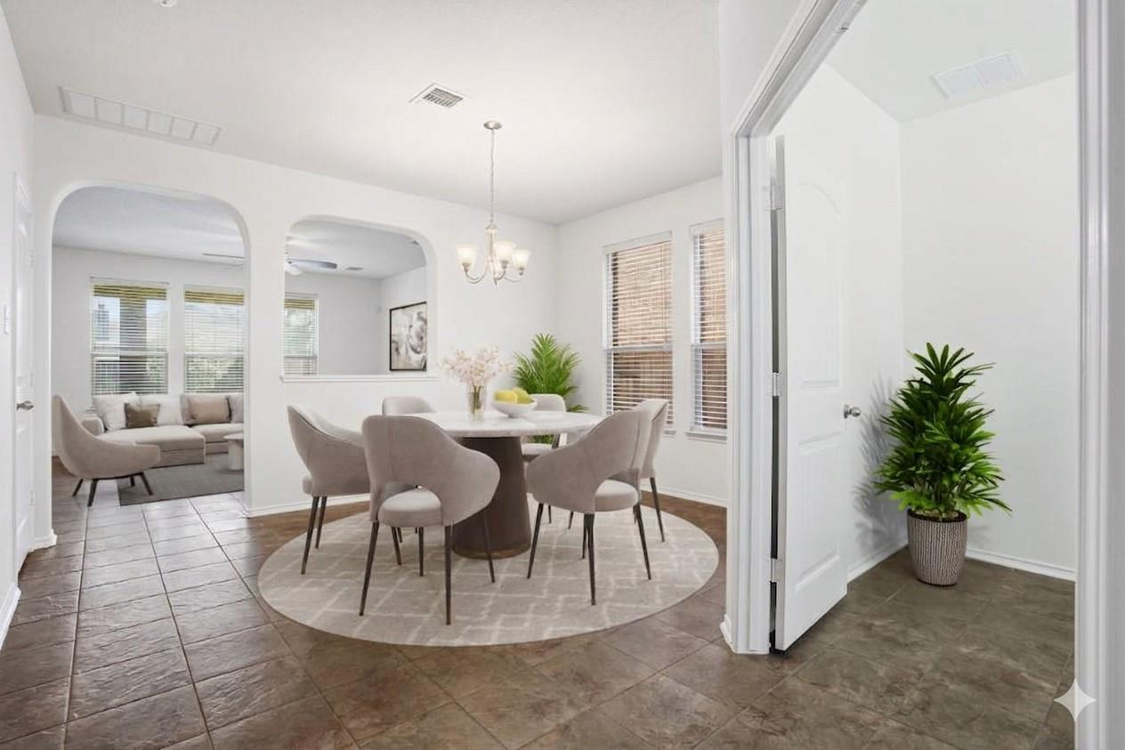 Arched openings and durable tile flooring connect