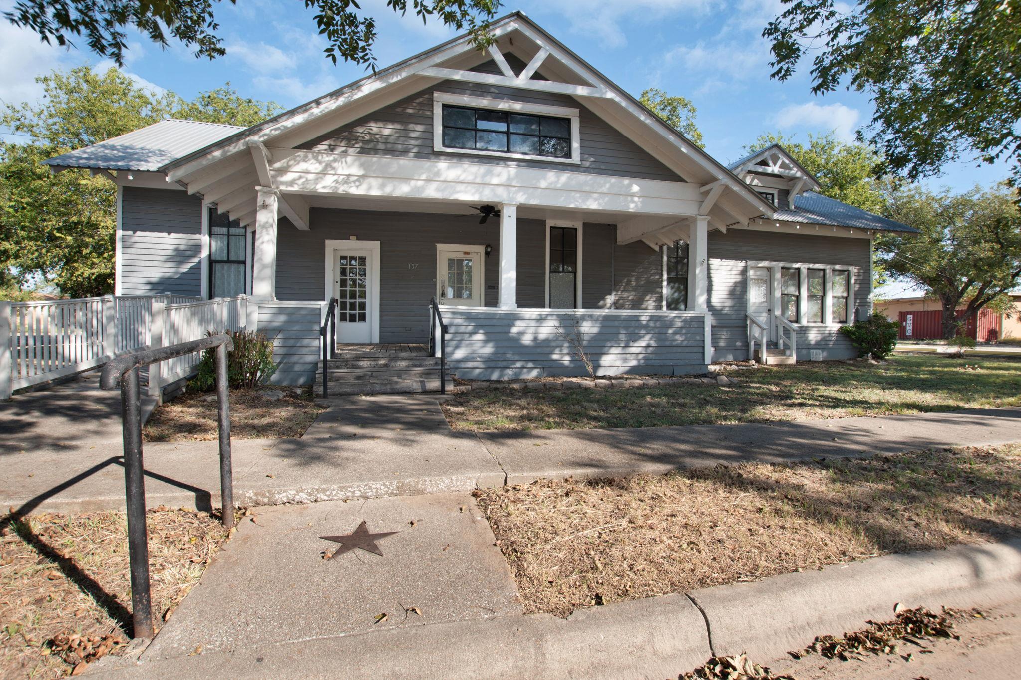Bungalow-style house with covered porch