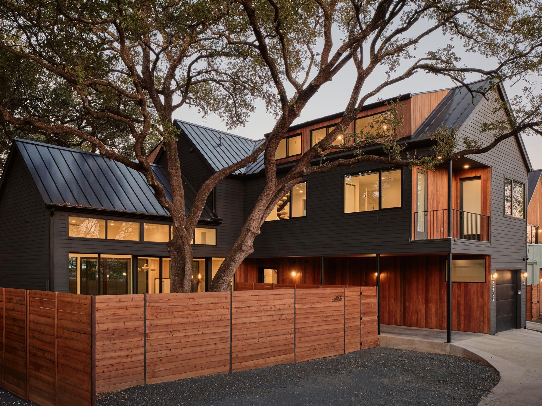 View of front of property featuring concrete driv