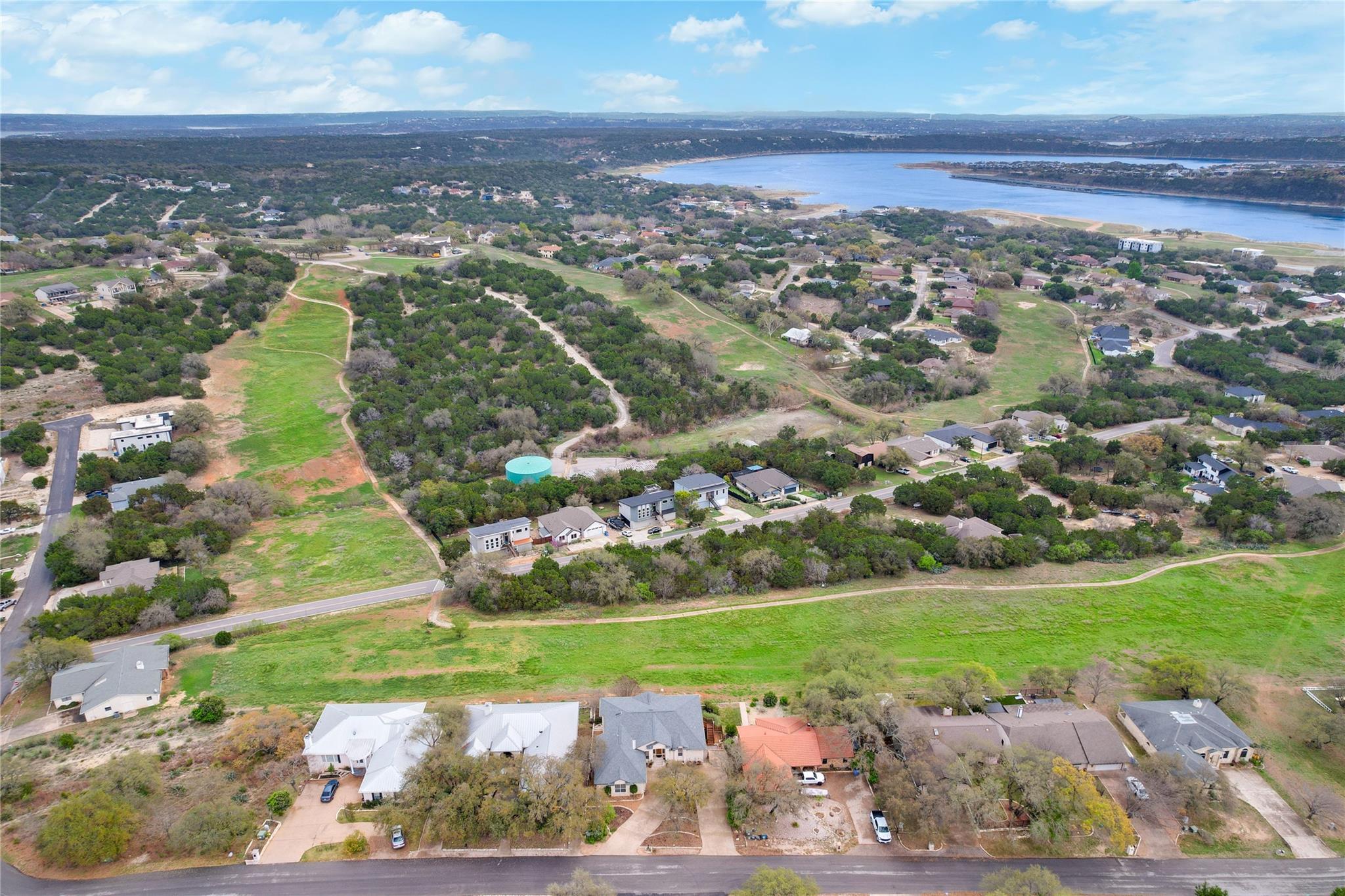 Aerial view of residential area featuring a nearb