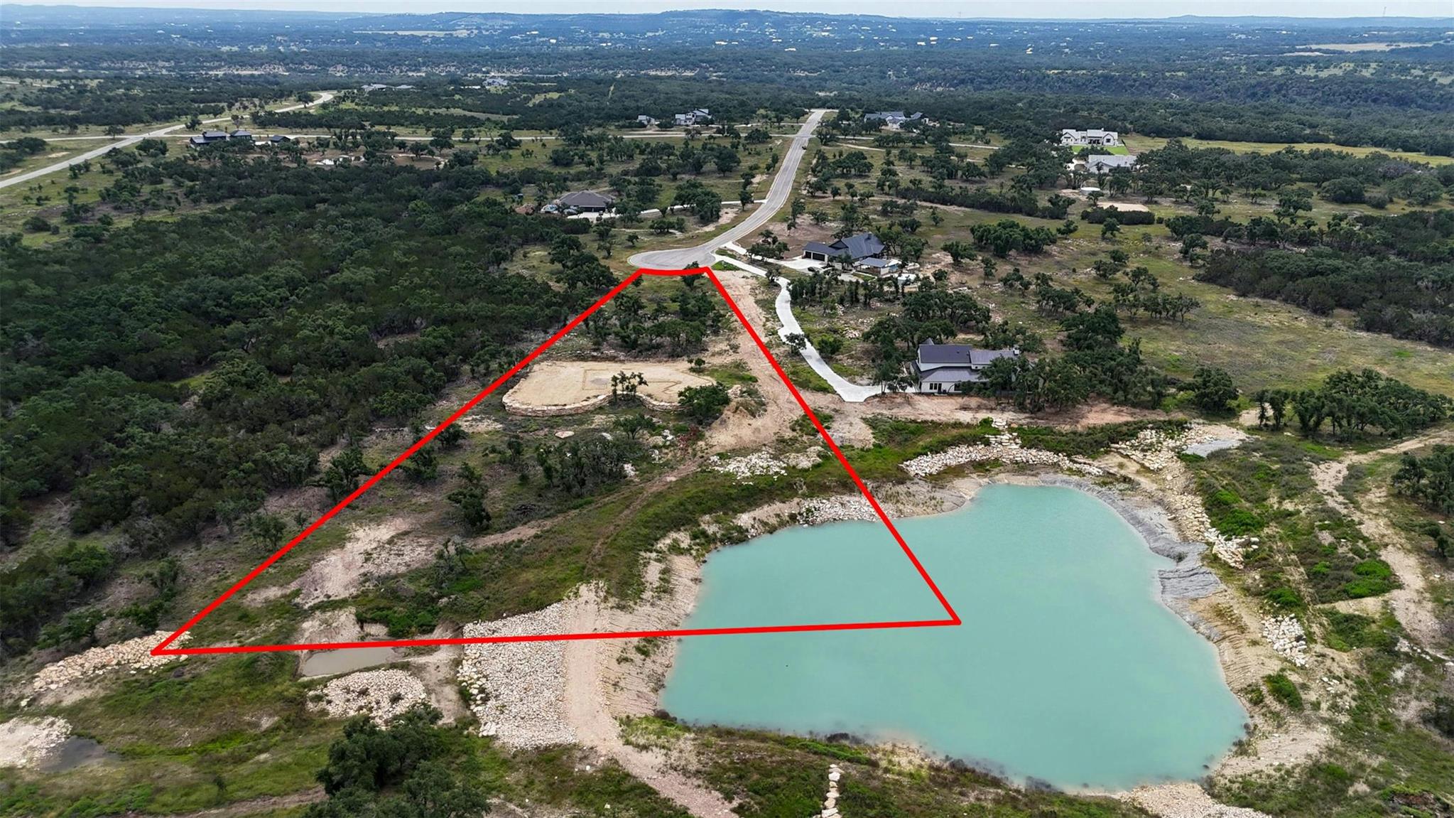 Aerial overview of property's location with prope