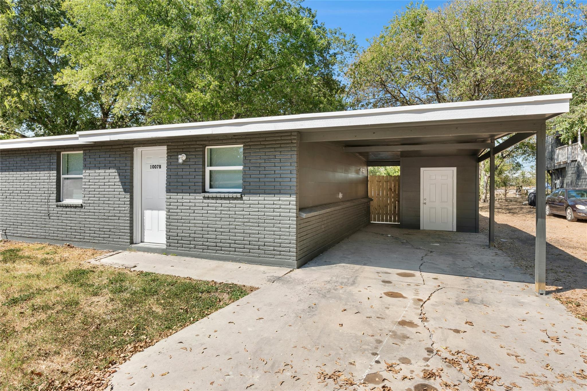 View of front of home featuring concrete driveway