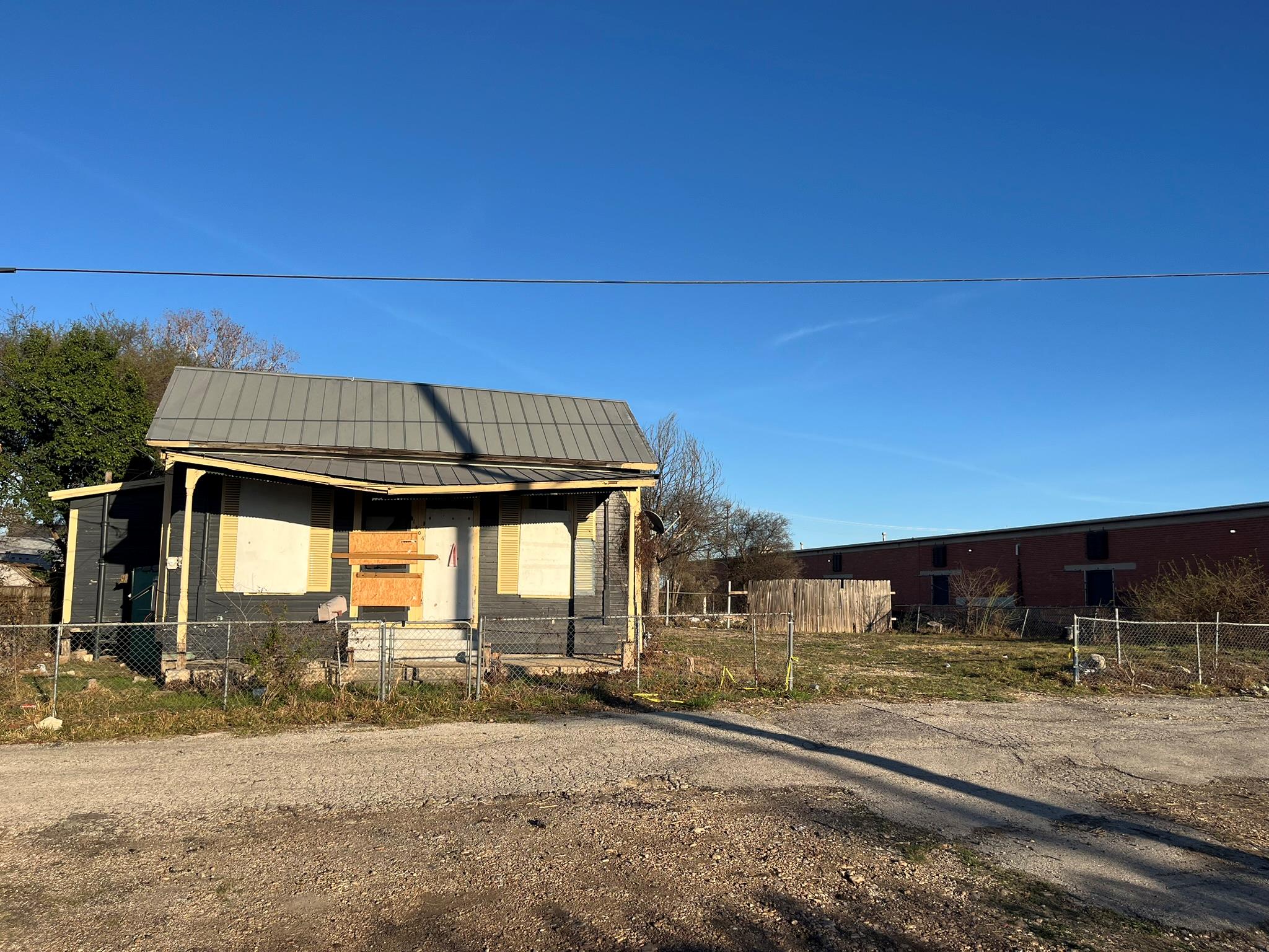 View of front of home with a fenced front yard an
