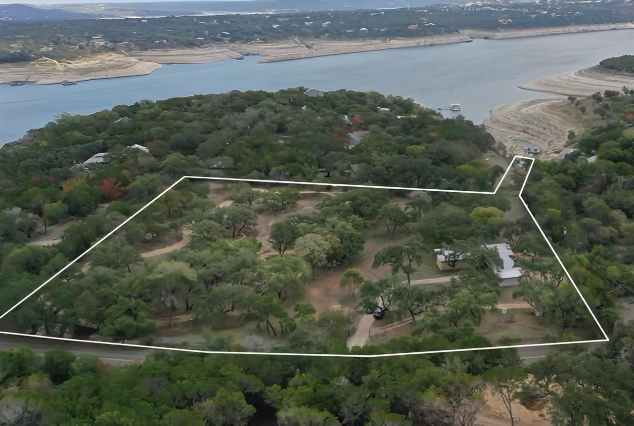 Aerial view showcasing a substantial property wit