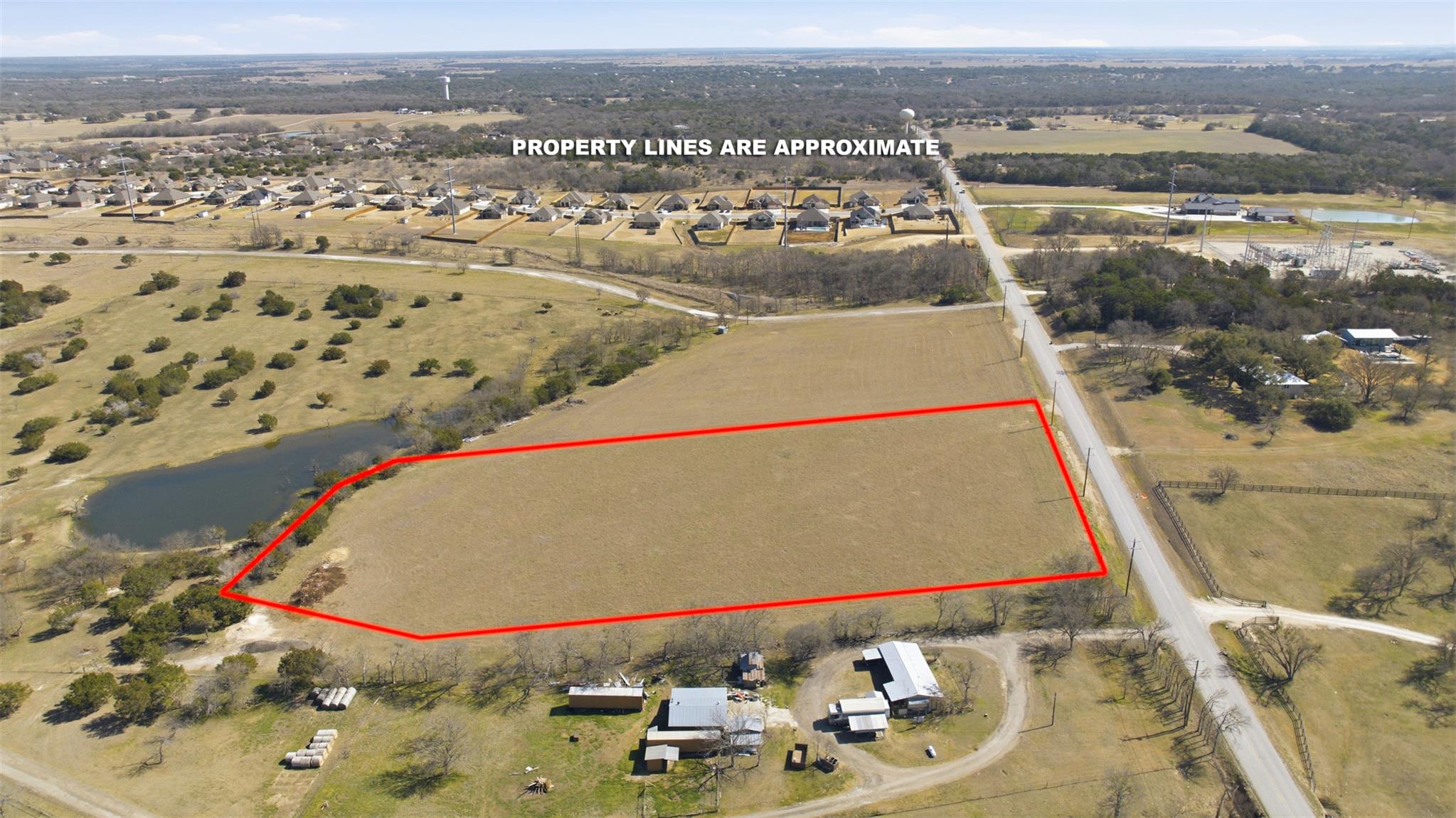 Aerial view of residential area featuring a large