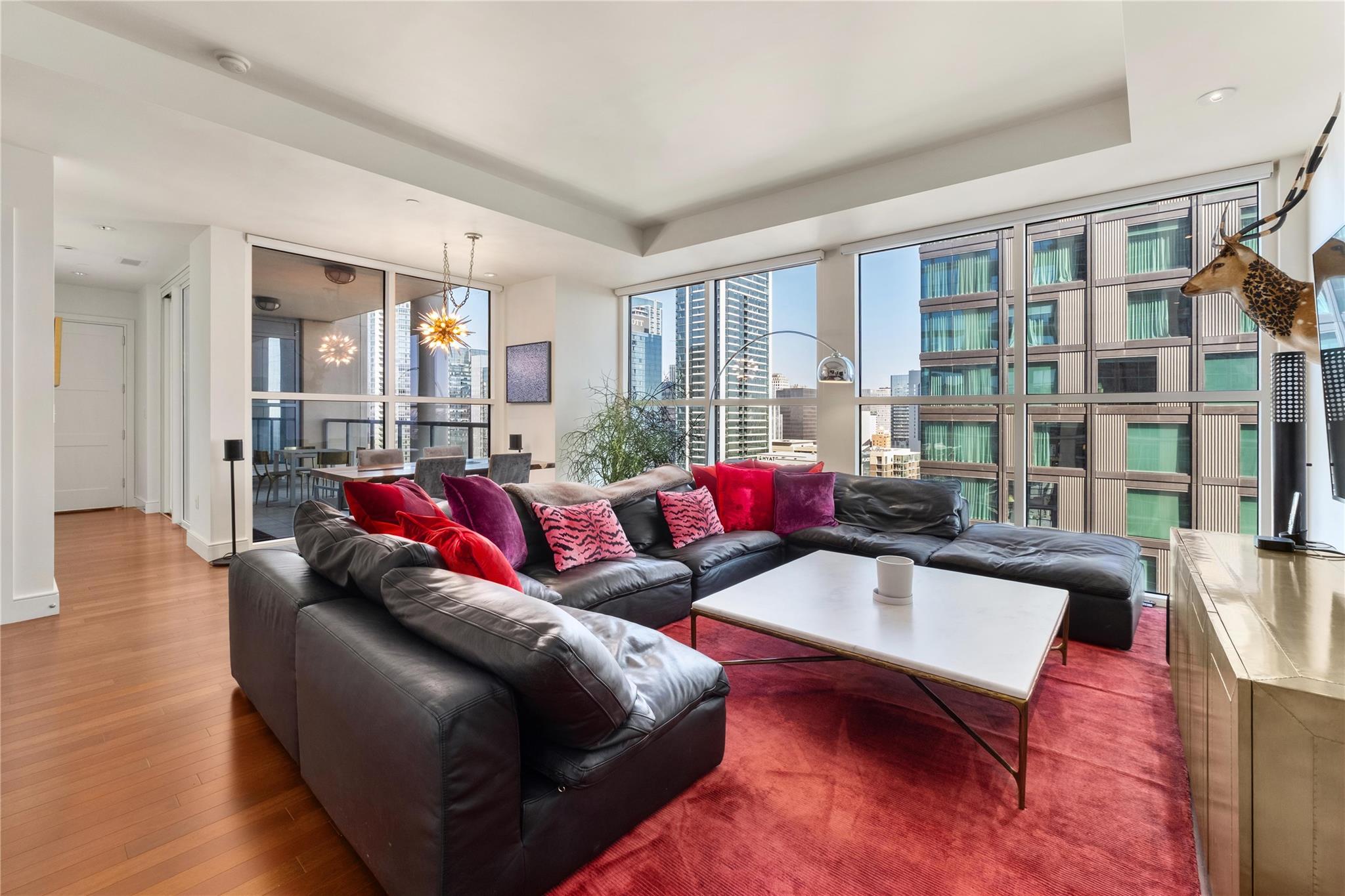 Living room with expansive windows, hardwood / wo