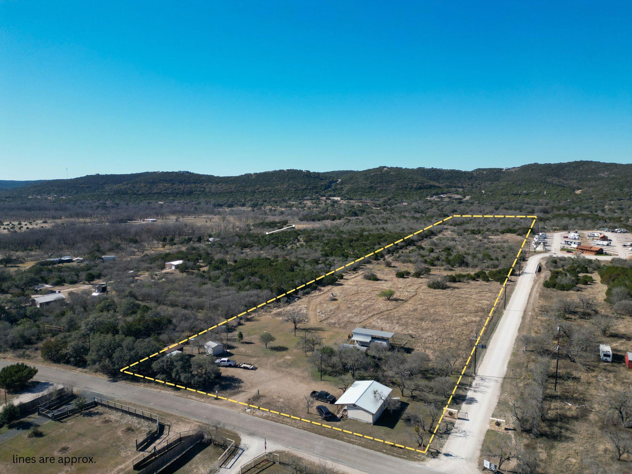 Aerial view of sparsely populated area with a mou