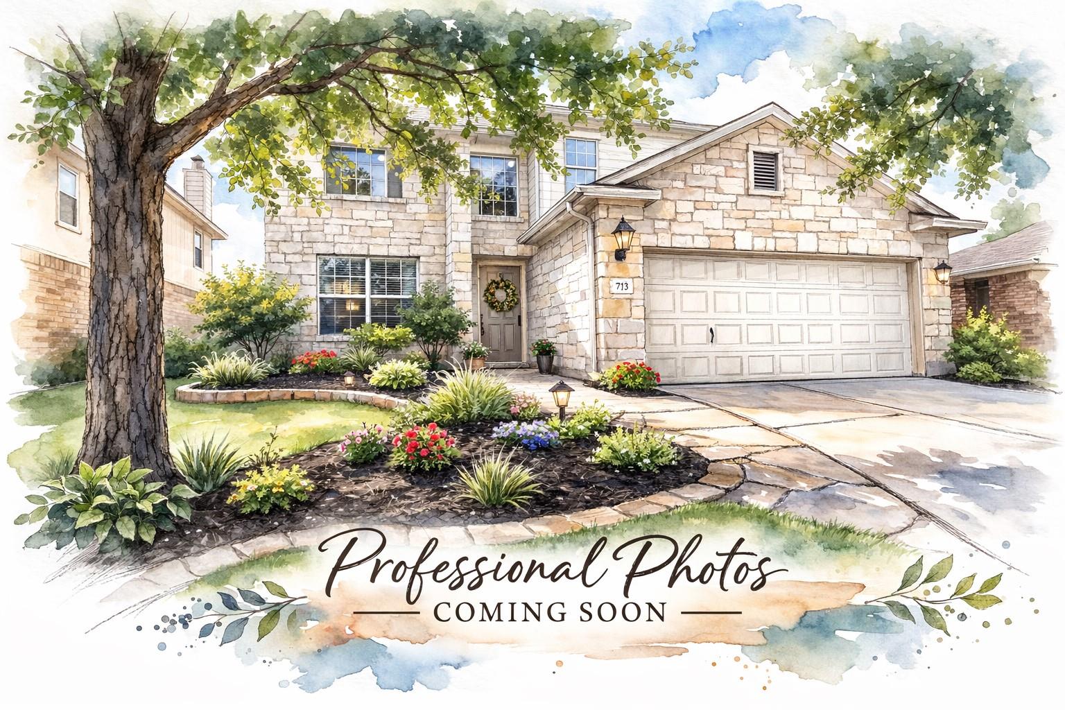 Traditional home with stone siding, concrete driv