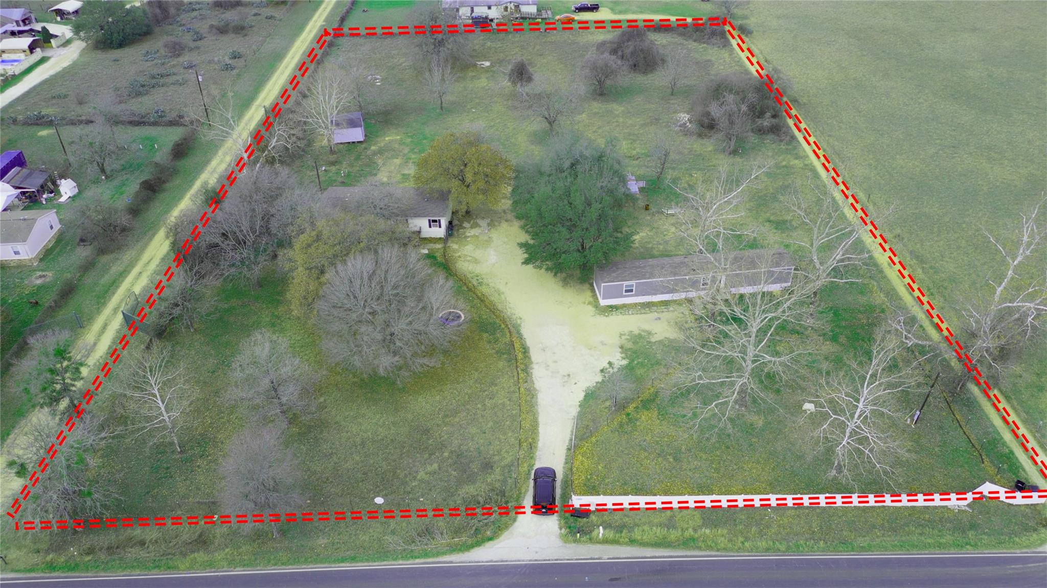 Aerial view of sparsely populated area with prope