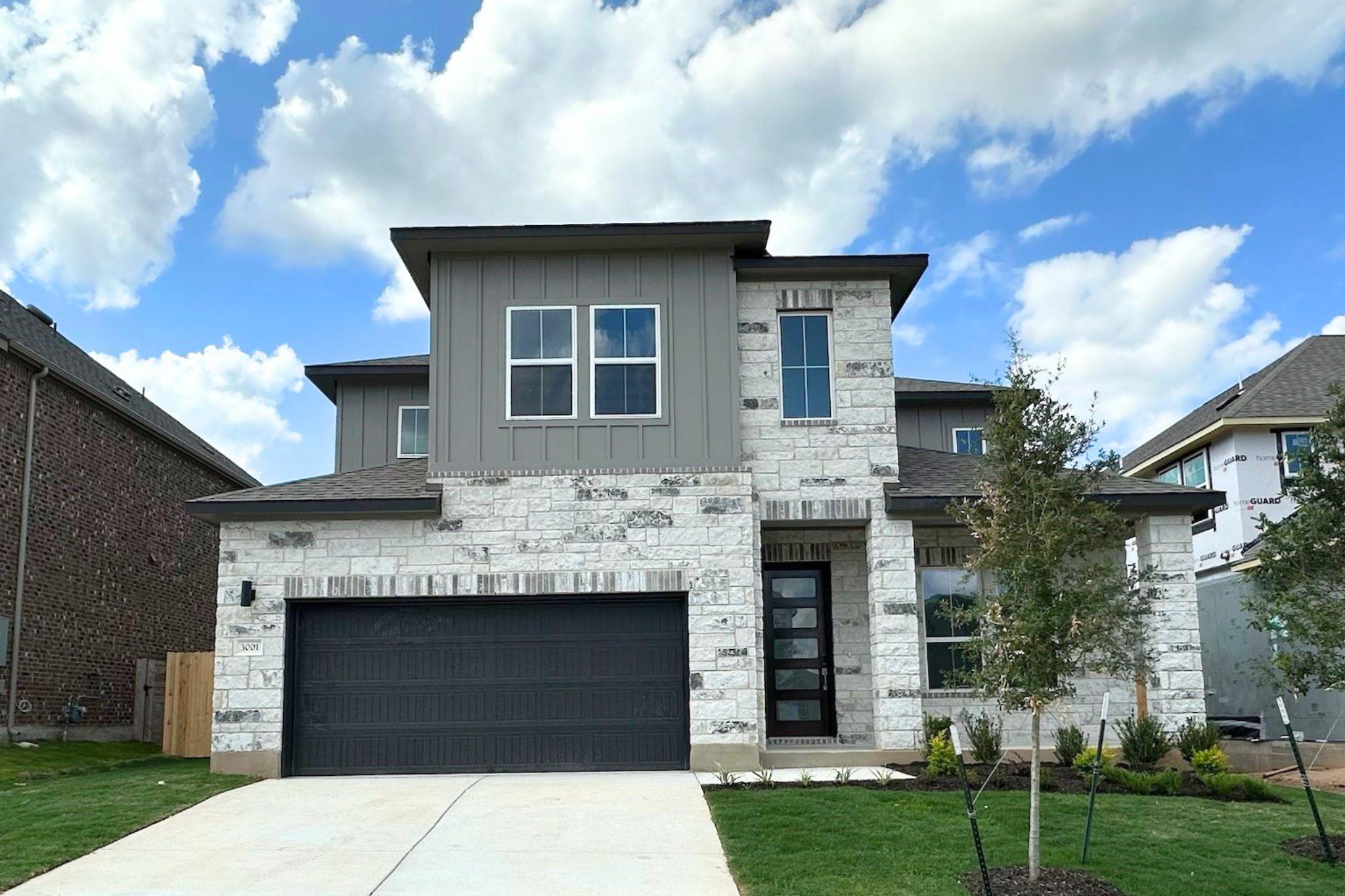 A modern facade with a blend of light stone and s
