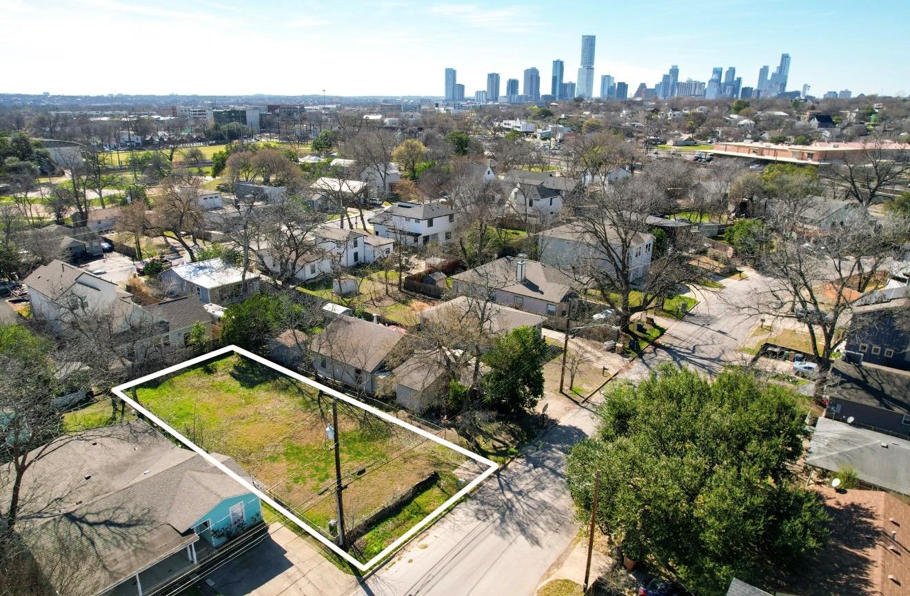 Aerial perspective of suburban area with property
