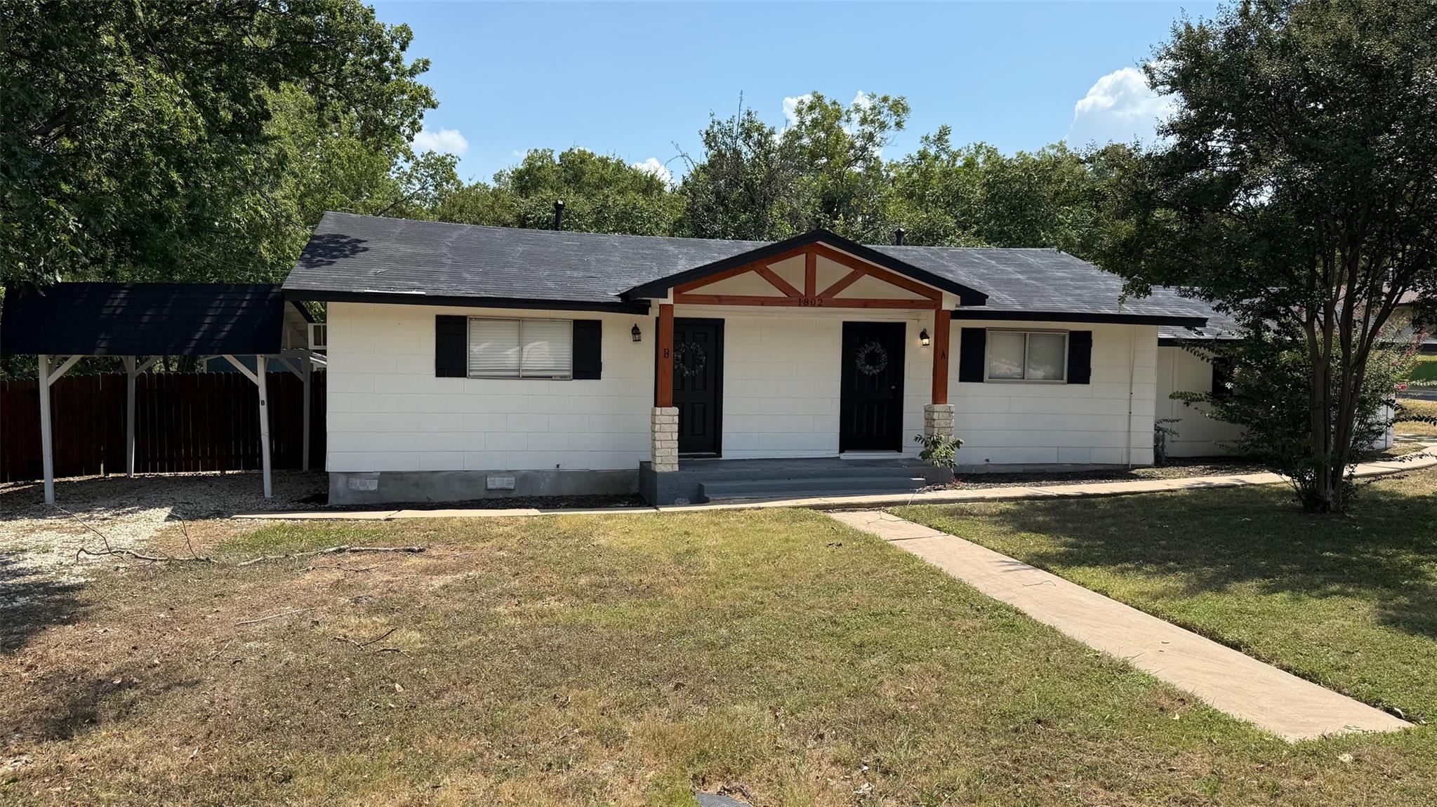 Ranch-style house with roof mounted solar panels,