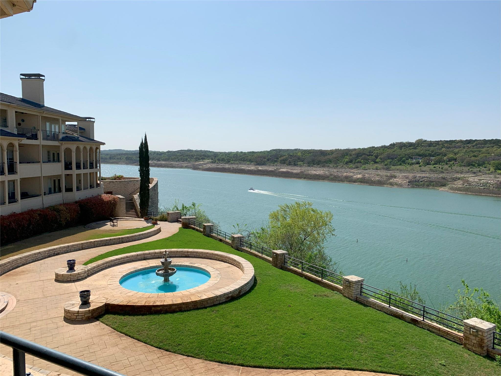 View of swimming pool featuring a water view and 