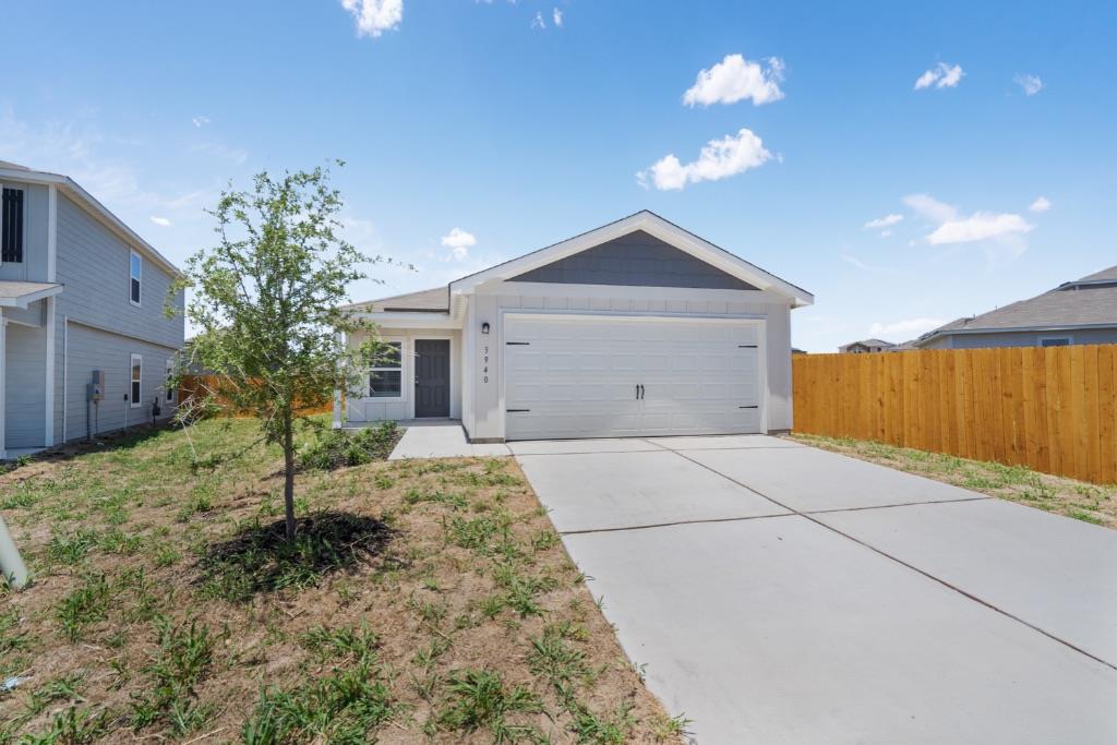 Ranch-style home featuring an attached garage and
