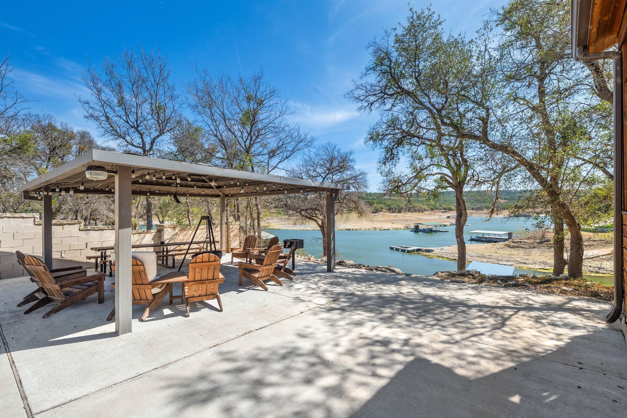 View of patio / terrace with a water view