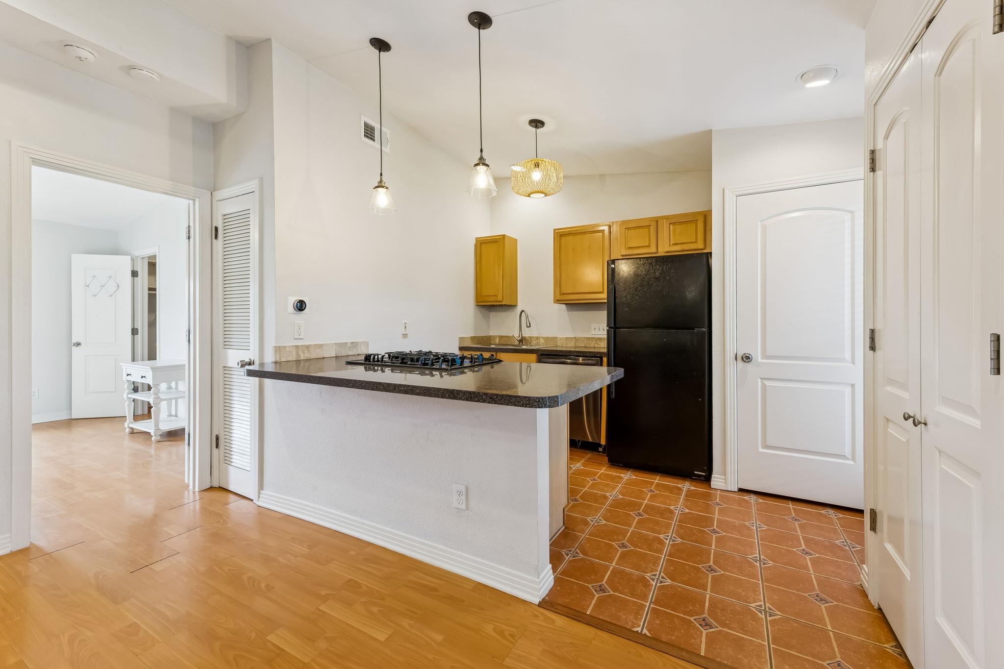 Kitchen featuring stainless steel appliances, a p