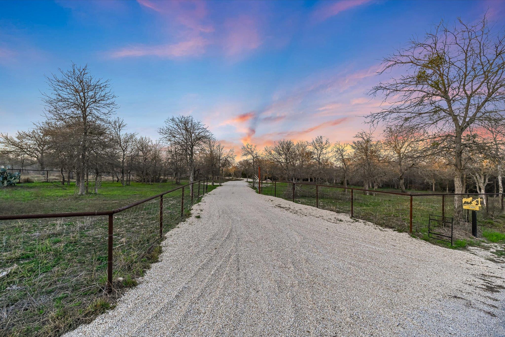 View of dirt / gravel road featuring a rural view