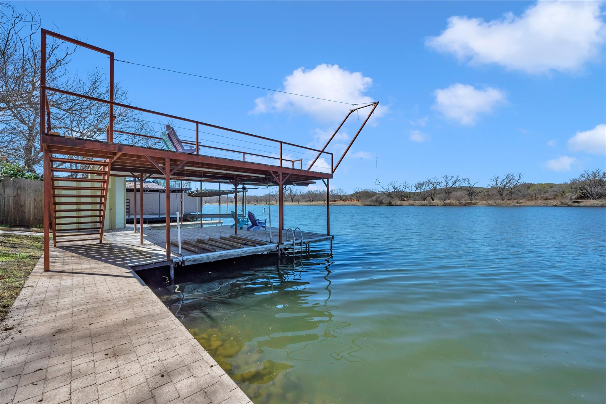 Dock with a water view and stairs