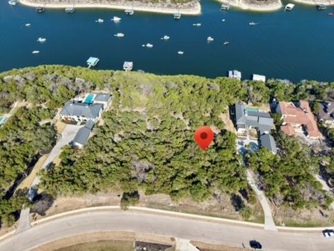 Aerial view of property's location with a large b