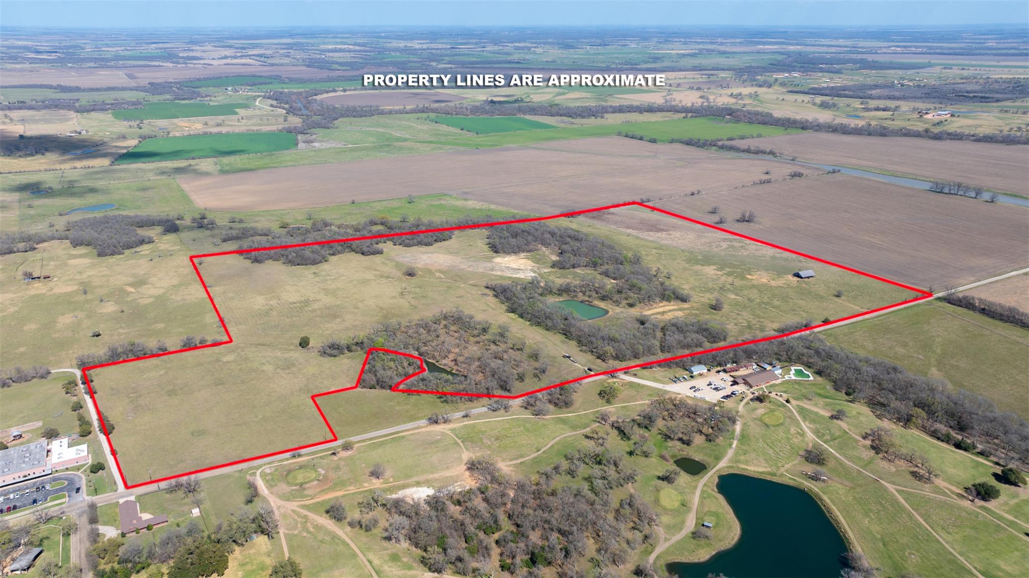 Aerial view of sparsely populated area with prope