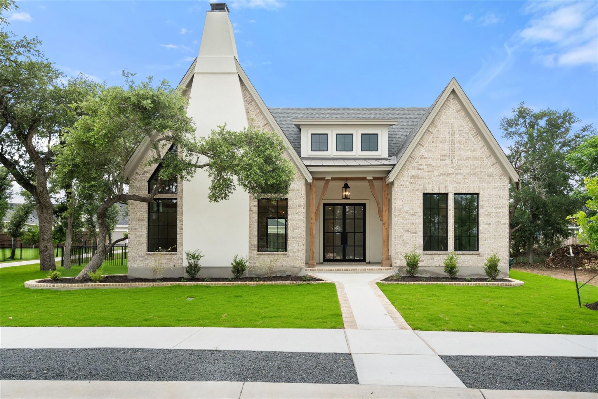 A charming facade presents an inviting entry with