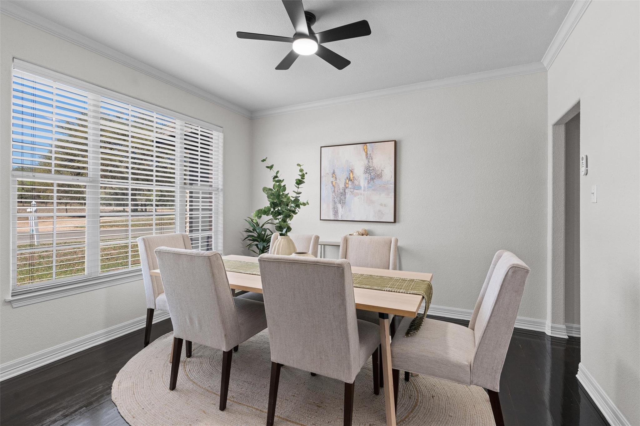 Dining space featuring ornamental molding, ceilin