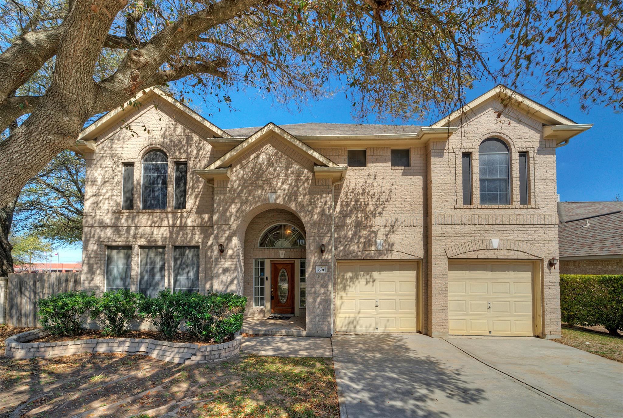 View of front of home featuring concrete driveway