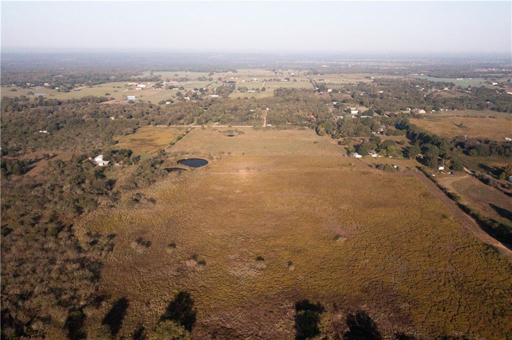 Aerial overview of property's location with rural