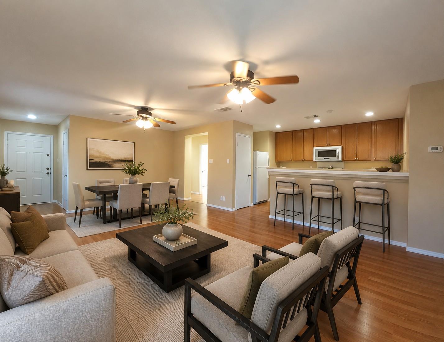 An inviting open-concept layout connects a well-a