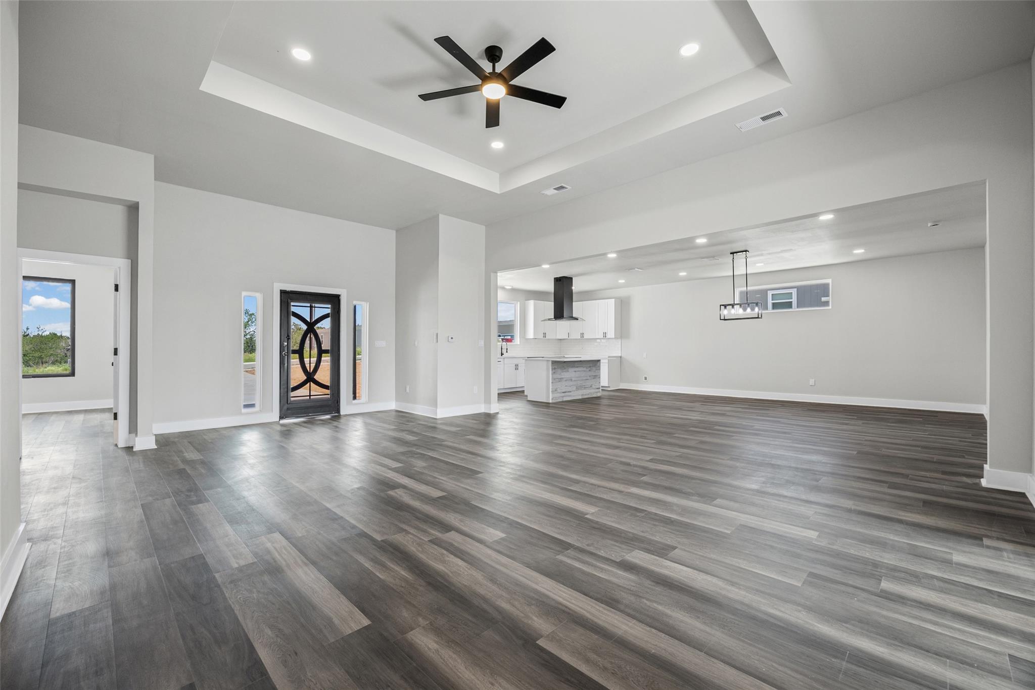 A spacious, open concept living area boasts elega