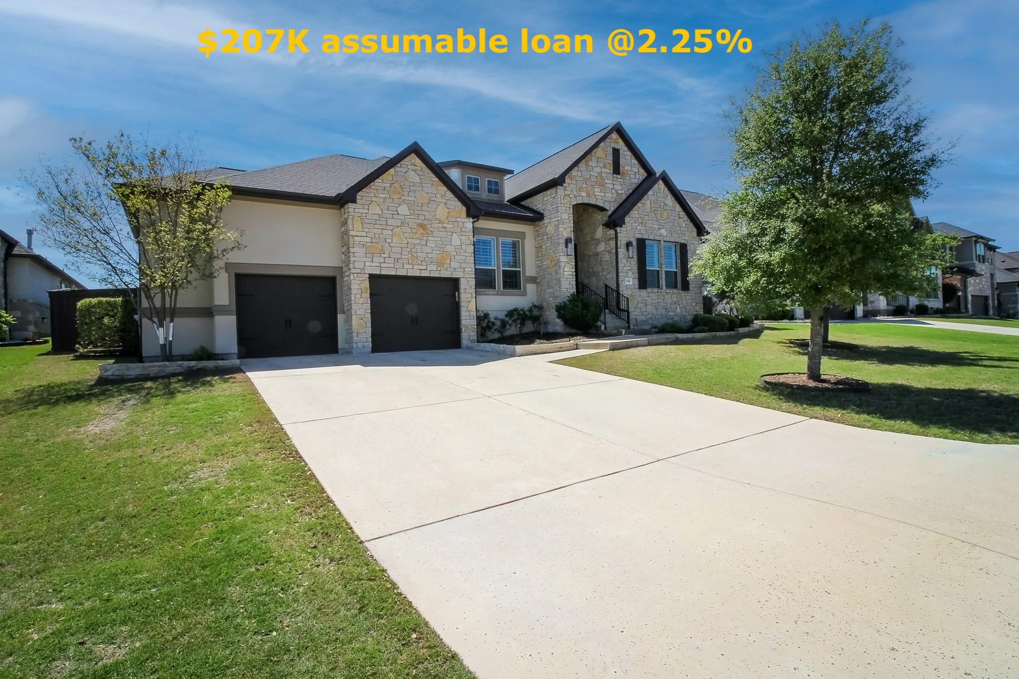 Welcoming front elevation with elegant stone acce