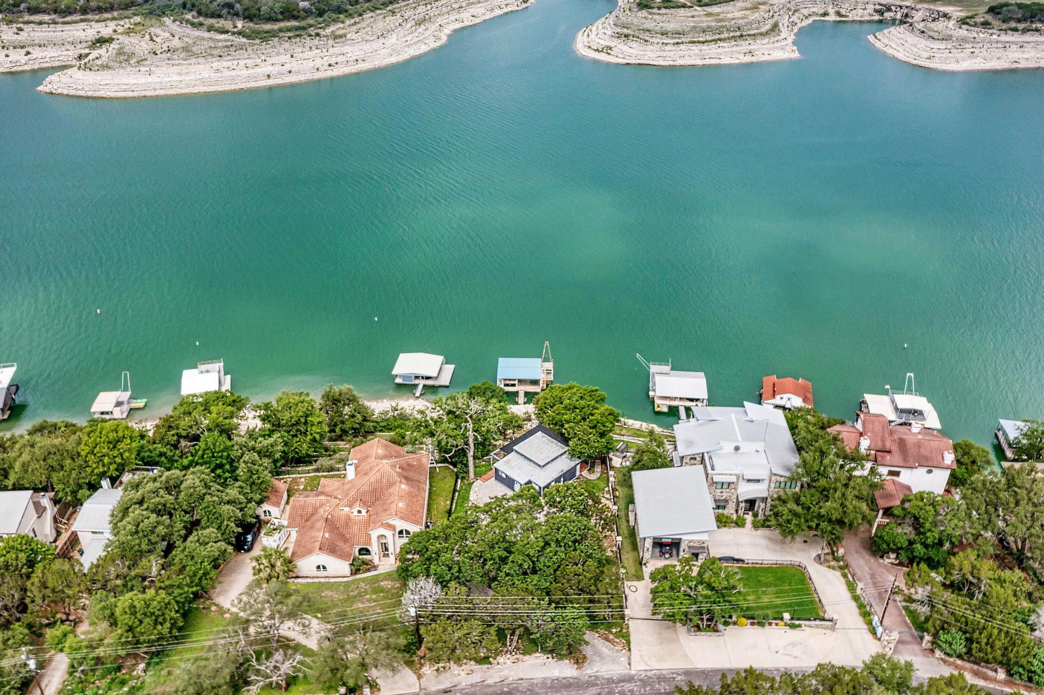 Aerial view of residential area with a nearby bod