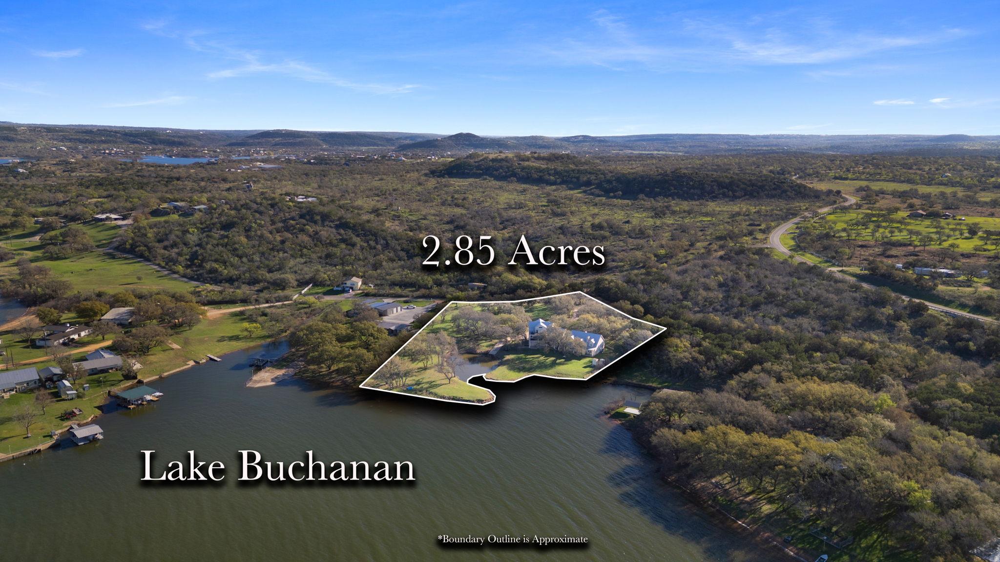 Aerial view of property and surrounding area with