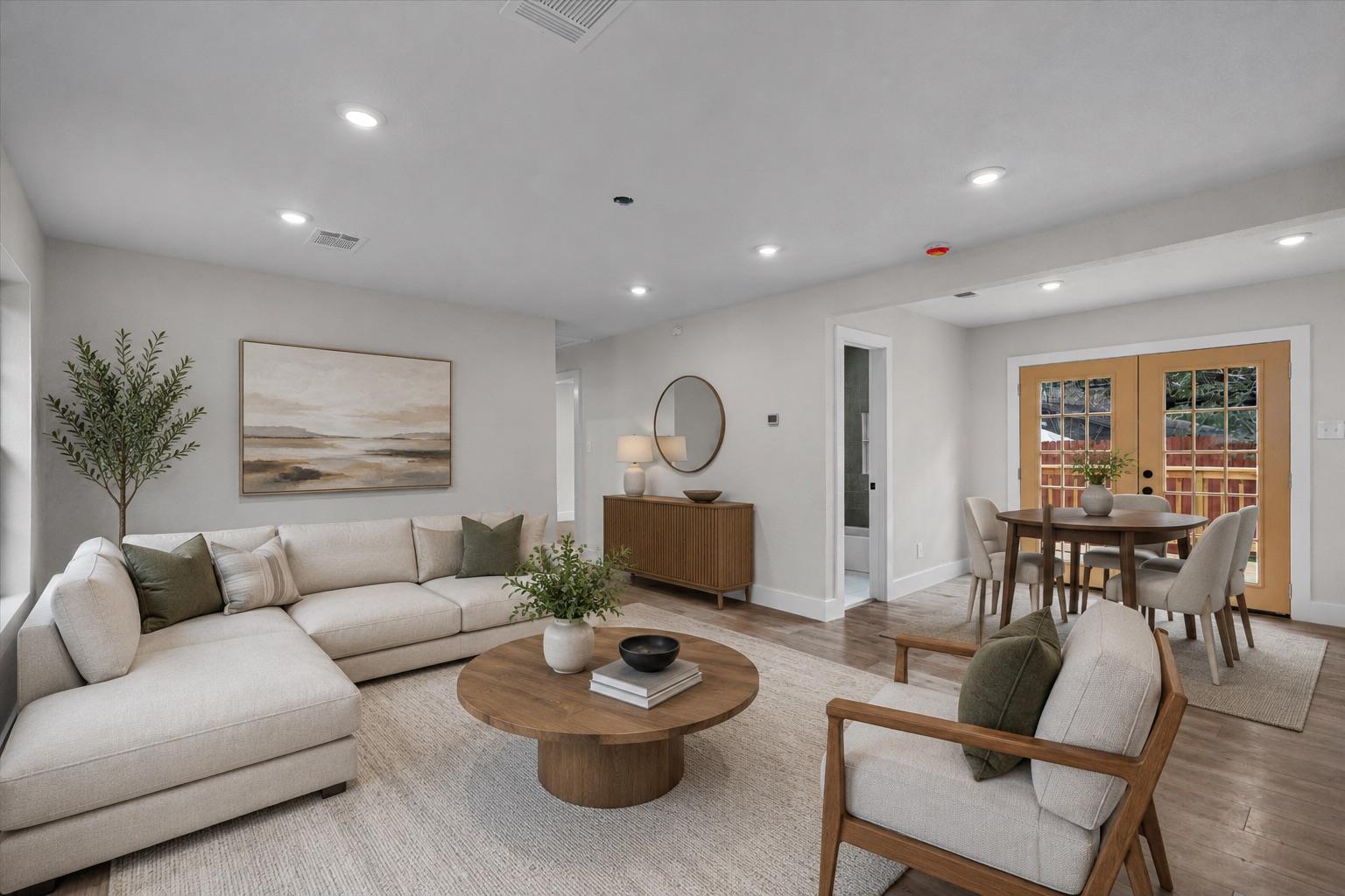An inviting open-concept layout connects a warm l