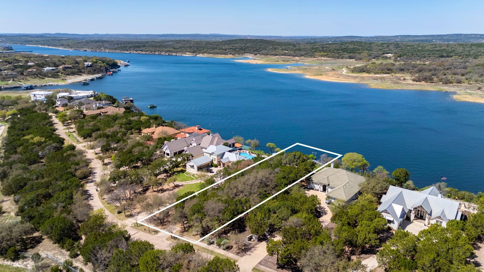 Aerial view of residential area with property par